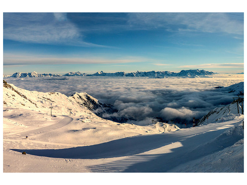 panoramic-canvas-print-above-the-clouds-in-the-snow