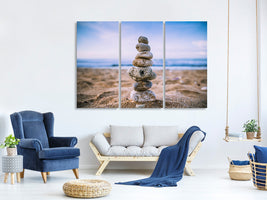 modern-4-piece-canvas-print-stone-pile-on-the-beach