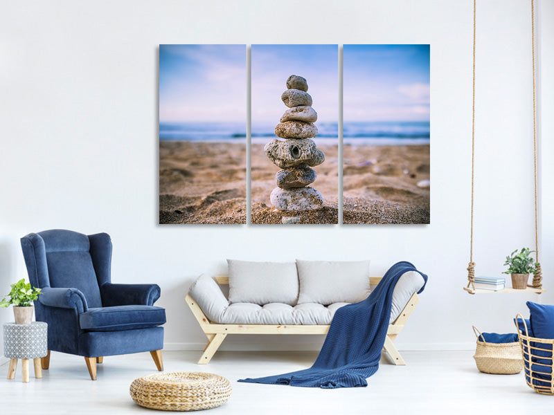 4-piece-canvas-print-stone-pile-on-the-beach
